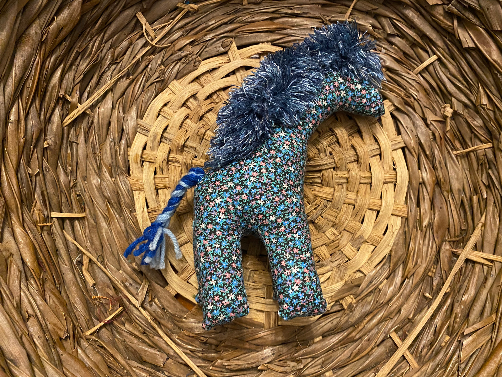 Giraffe blue with multi colored flowers