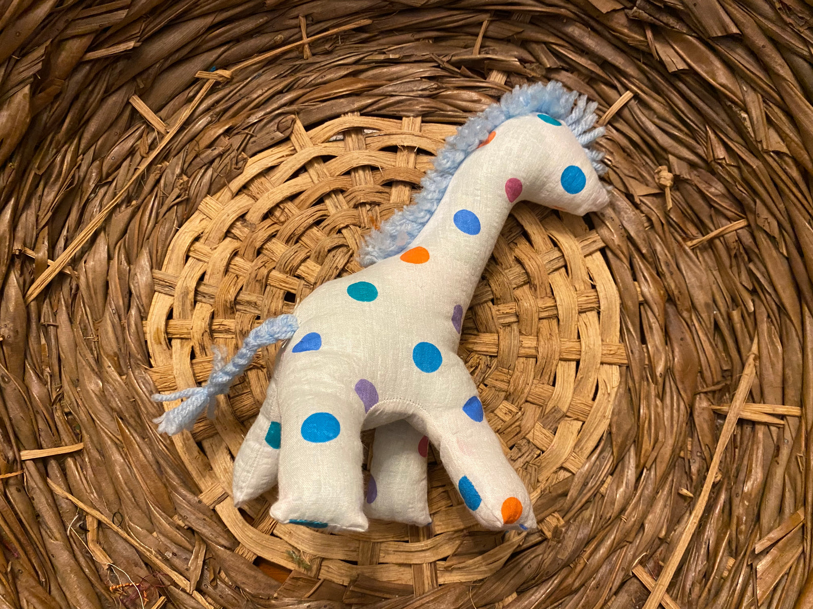 Giraffe white with multi-colored polka dots