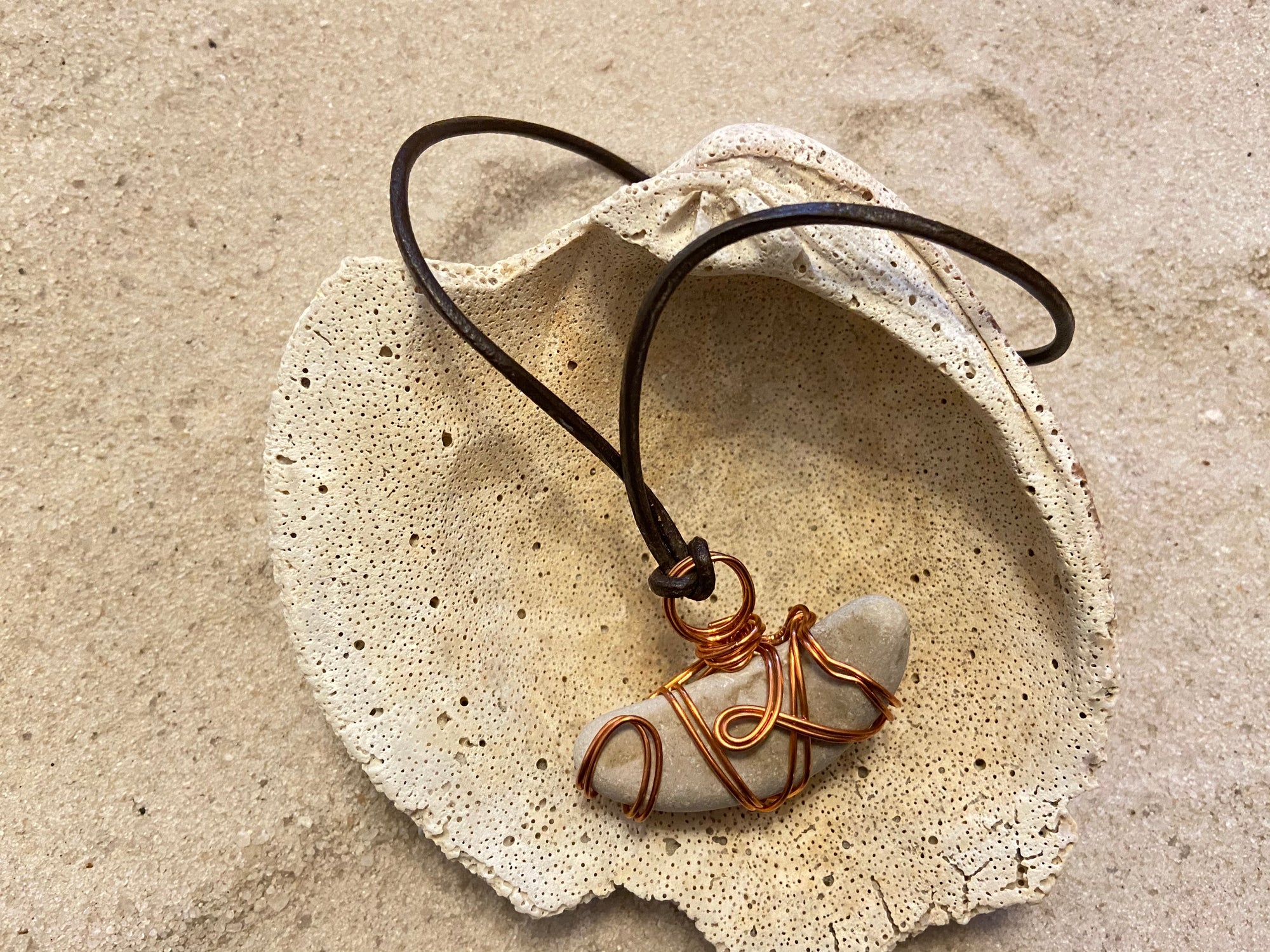 B. Light Necklace- Copper Wire Wrapped Stone on Adjustable Leather Cord