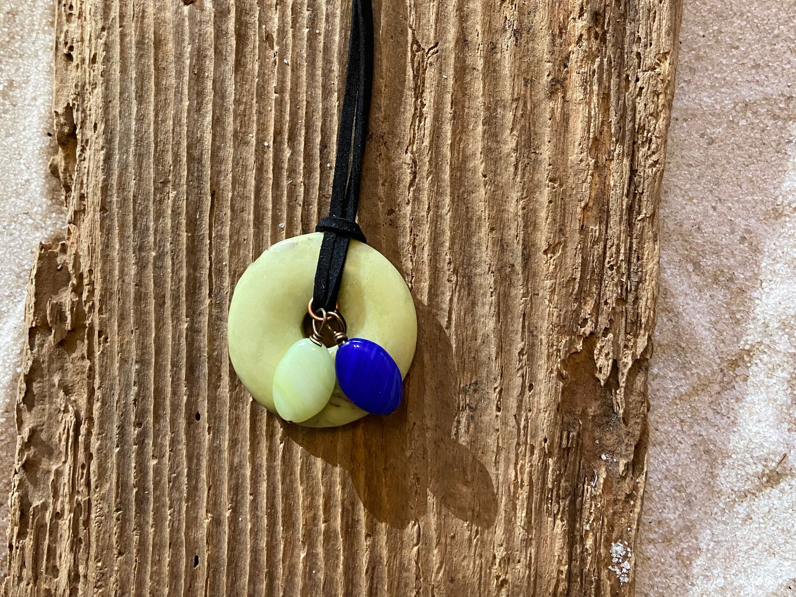 B. Light Necklace - Green Stone Disc with Green and Blue Glass Accents