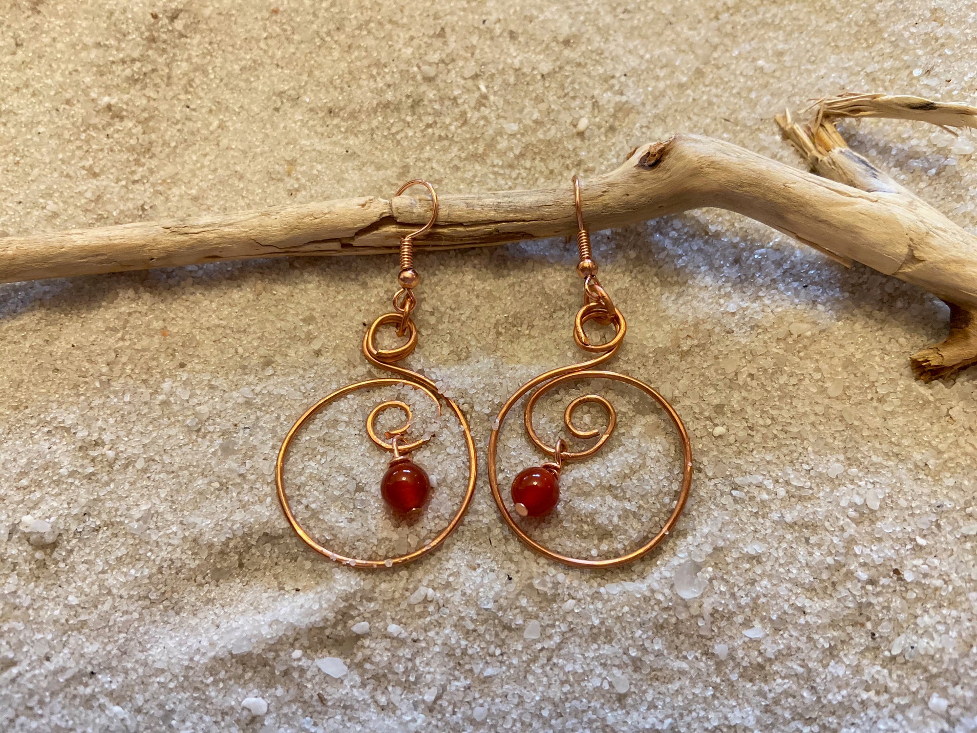 B. Light Earring - Copper Swirled Wire Earrings with Ruby Red Glass Accents