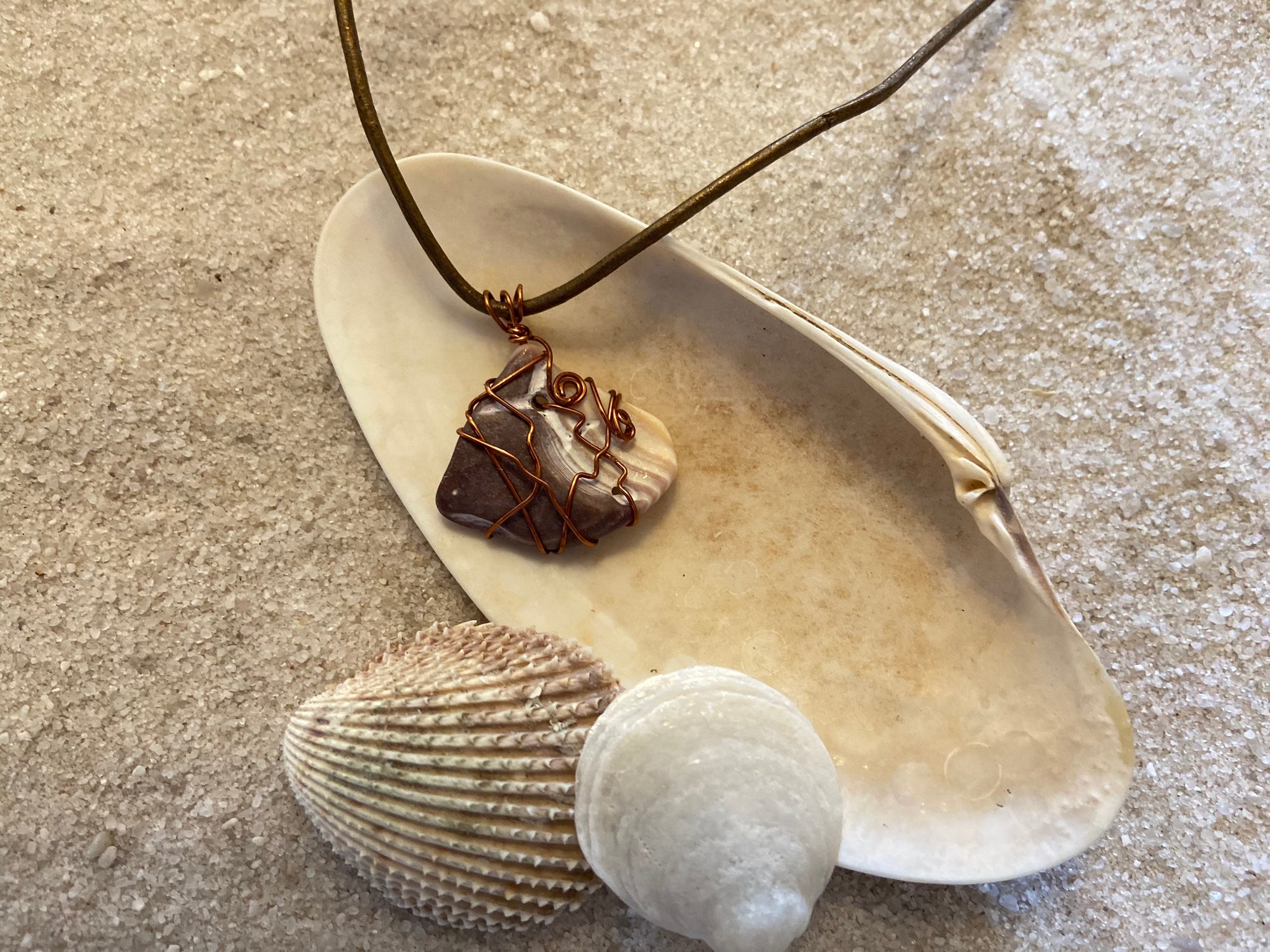 B. Light Necklace - Copper Wrapped Haitian Shell on Adjustable Leather Cord