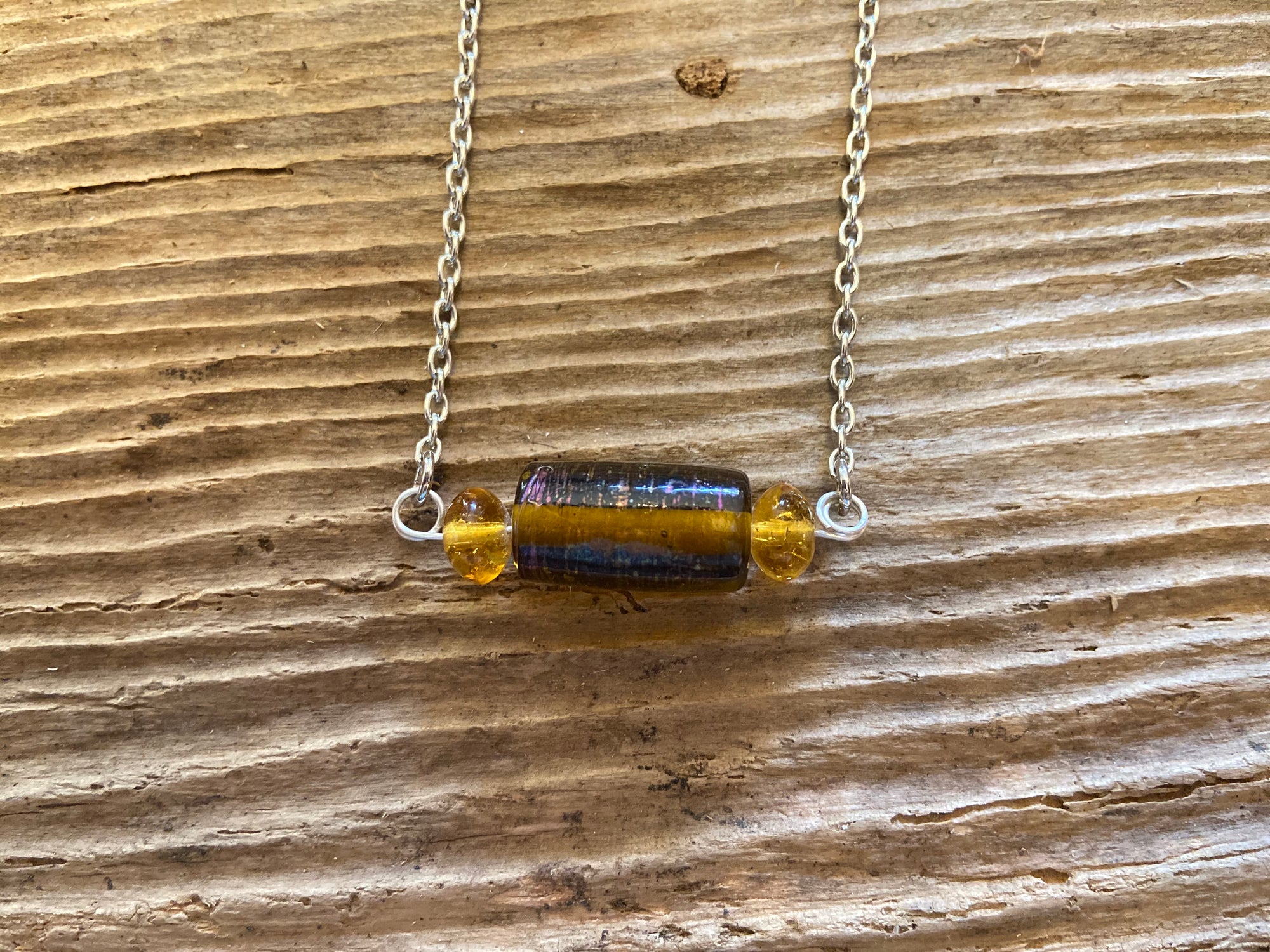B. Light Necklace - Amber Glass Bead on a Silver Chain