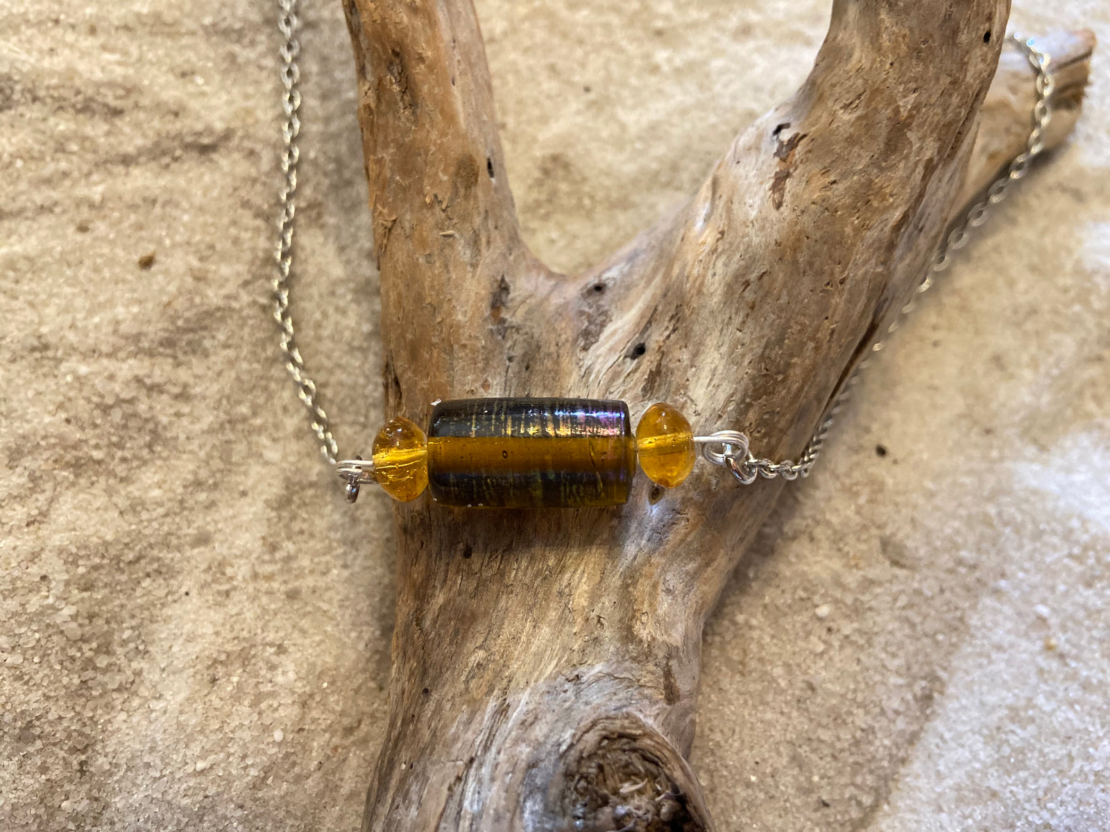 B. Light Necklace - Amber Glass Bead on a Silver Chain