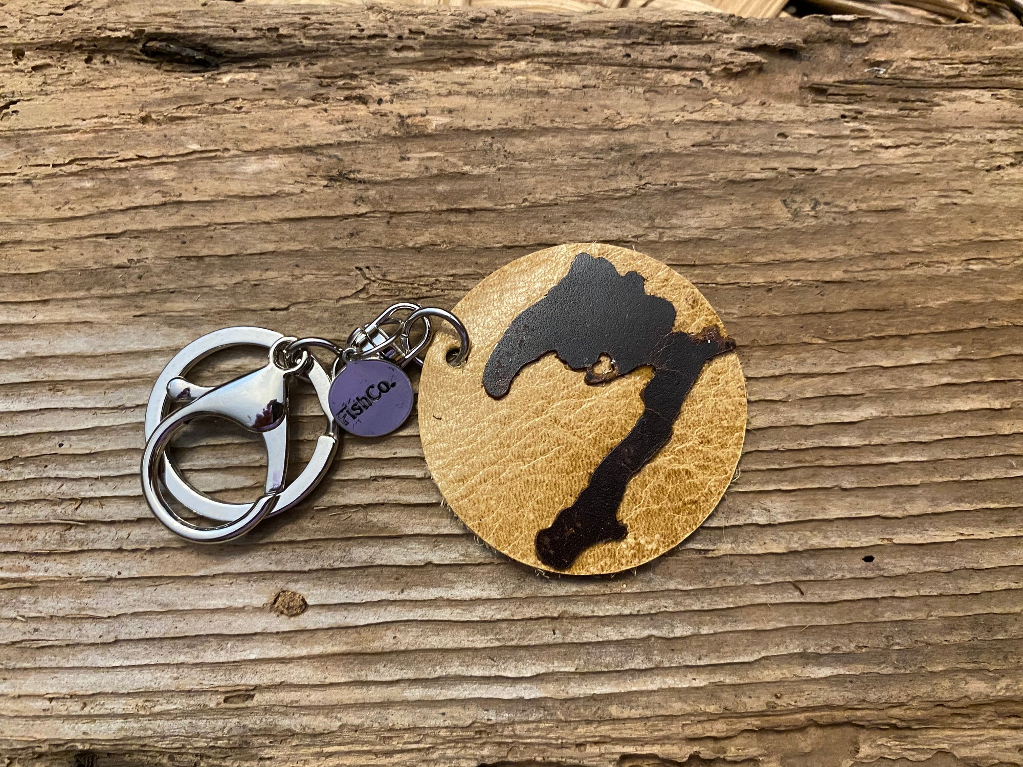 Kwi Keychain featuring hickory on buff leather with silver or gold metal attachments